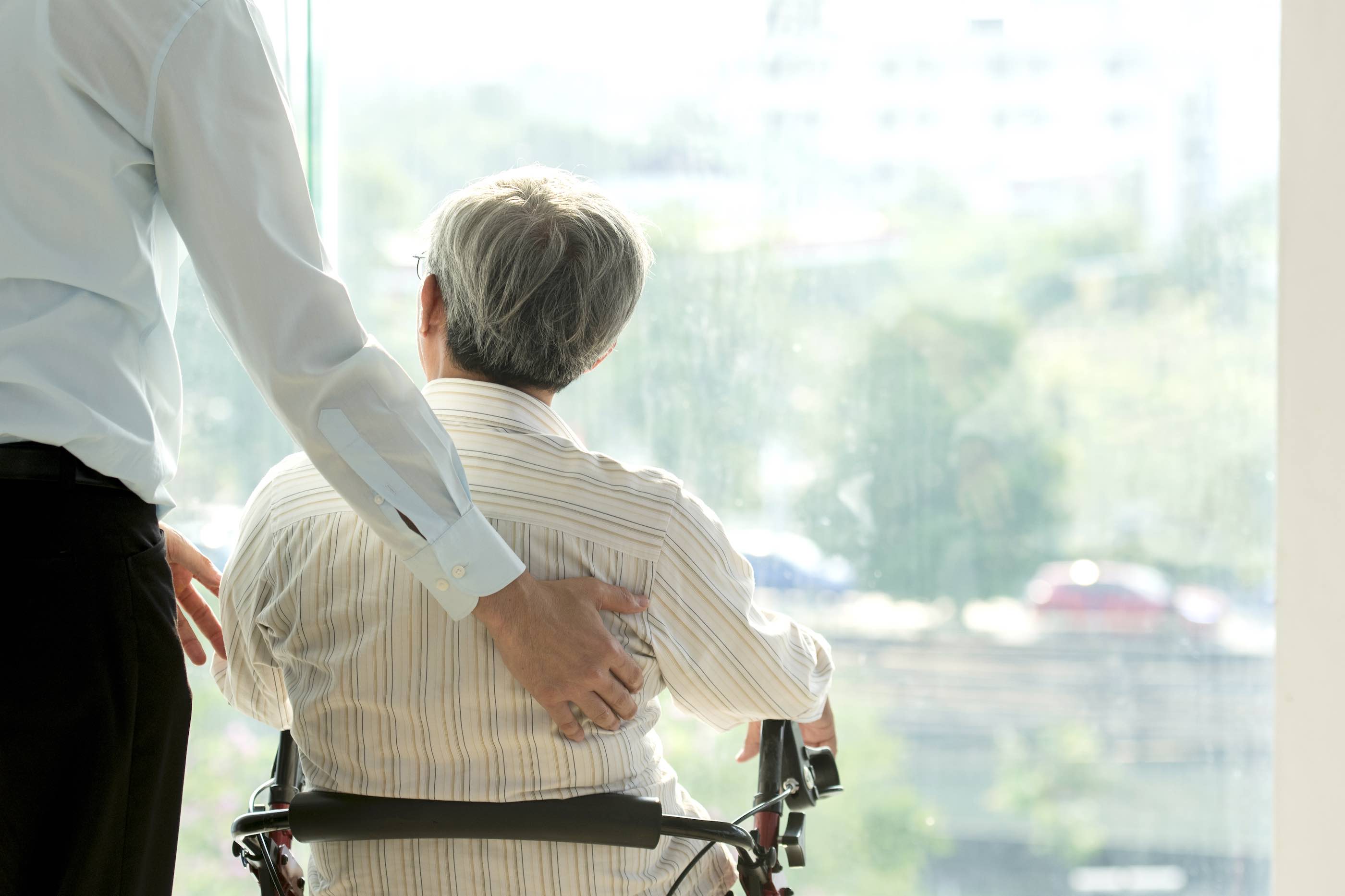 Old man on wheel chair and doctor in hospital Healthcare and Medical concept for comercial